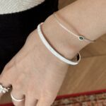 Multi-layered silver bracelet featuring vertical stripes and blue zirconia stones - Image 4