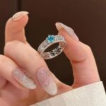 Cool-toned blue openwork zirconia ring - Image 4