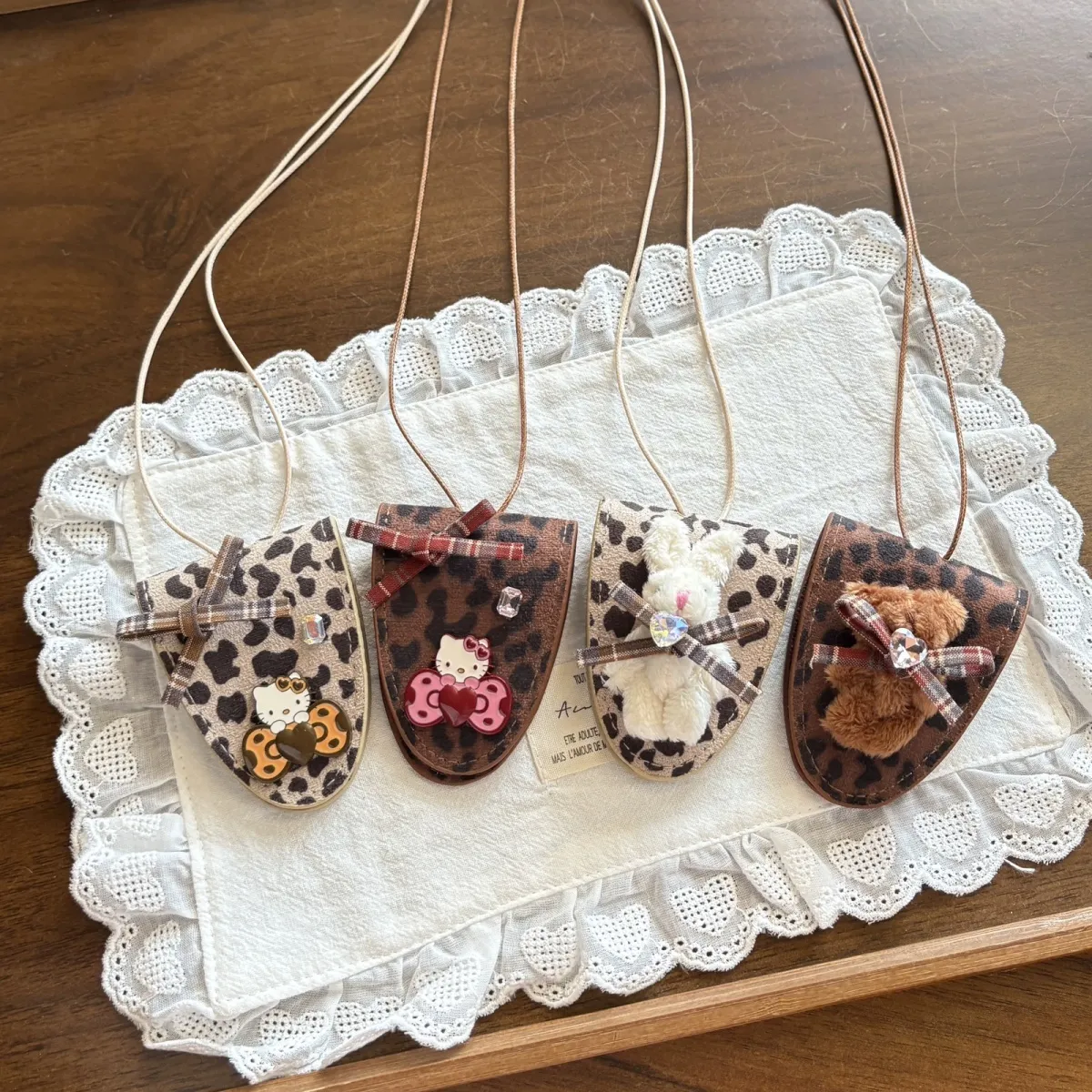 33914ba1-2af7-468a-acfa-c7086f104a5d Mini Kitty Cat Triangle Bag - Image 1